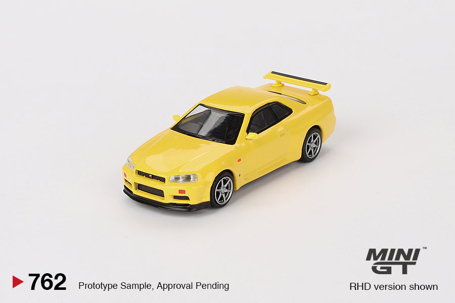 Mini GT 1:64 Nissan Skyline GT-R (R34) V-Spec – Amarillo Relámpago - Exclusivas de MiJo Blister