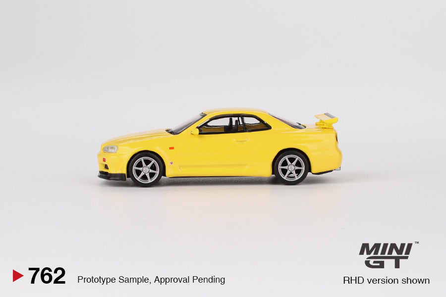 Mini GT 1:64 Nissan Skyline GT-R (R34) V-Spec – Amarillo Relámpago - Exclusivas de MiJo Blister