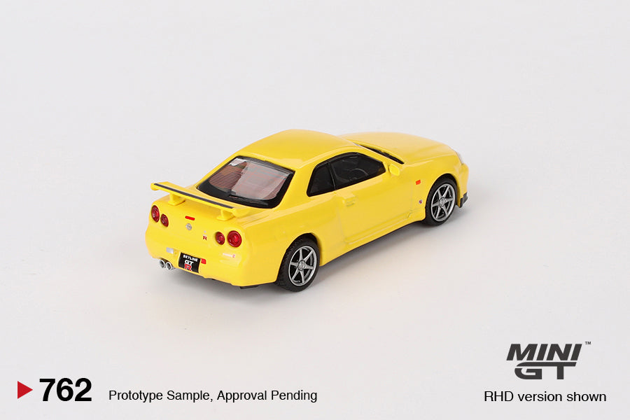 Mini GT 1:64 Nissan Skyline GT-R (R34) V-Spec – Amarillo Relámpago - Exclusivas de MiJo Blister
